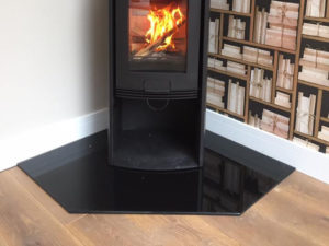 A 20mm Bespoke Corner Hearth in Polished Granite for free standing stove