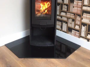 A 20mm Bespoke Corner Hearth in Polished Granite for free standing stove