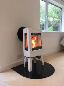 A “D” Shaped Hearth in Smoked Glass for a free standing stove