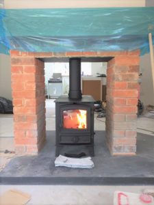 Double sided wood stove